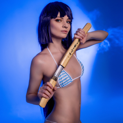 Akatsuki, holding a sword close to her, strikes a powerful pose in a blue and white striped bikini. The deep blue background complements her focused expression, creating an intense yet calm atmosphere.