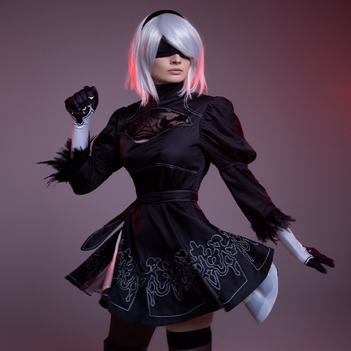 An enigmatic figure stands poised for battle, short white hair illuminated by a soft red glow. Dressed in a black, intricately embroidered dress, her gloved fist clenched, she radiates an aura of power and readiness, echoing the iconic 2B from Nier: Automata.