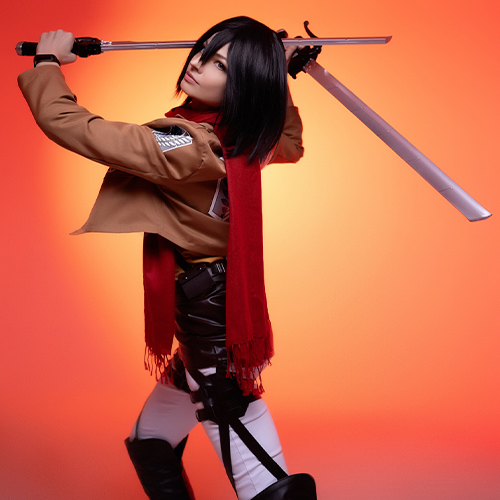 Mikasa Ackerman from Attack on Titan ready for battle, wielding dual blades in a powerful pose, illuminated by a vibrant orange background