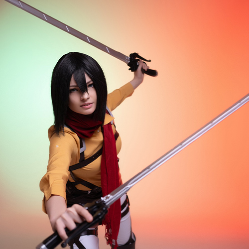 Dynamic portrayal of Mikasa Ackerman from Attack on Titan, holding dual blades in a fierce combat stance, against a warm, glowing background