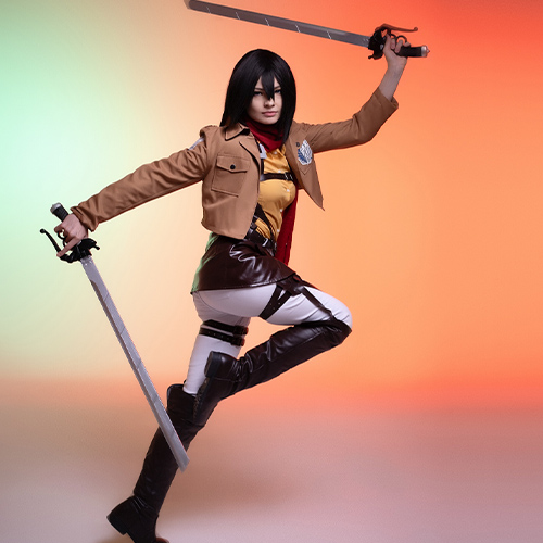 Dynamic action pose of Mikasa Ackerman from Attack on Titan, wielding dual blades in mid-motion, ready for combat, set against a warm, gradient background