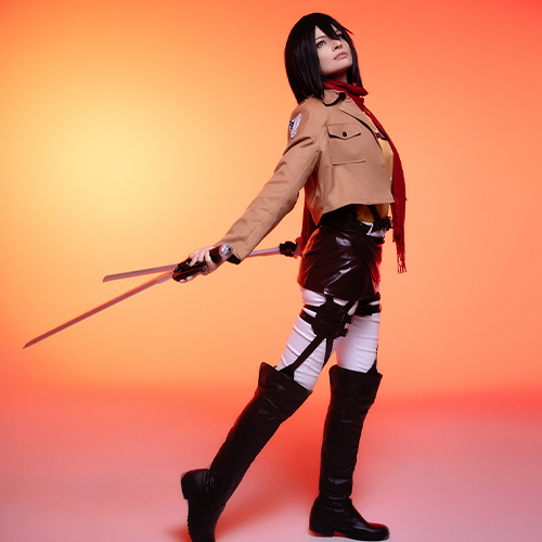 Mikasa Ackerman gracefully walking forward with her blades extended behind, wearing the iconic Survey Corps uniform, set against a warm orange backdrop