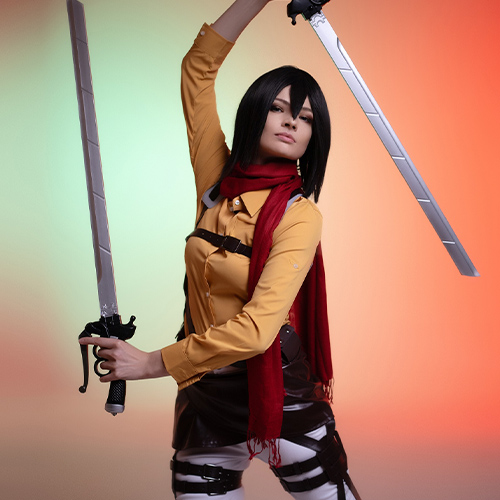 Mikasa Ackerman confidently raising her dual blades, dressed in the Survey Corps uniform from Attack on Titan, with a bold pose against a gradient background of green and orange