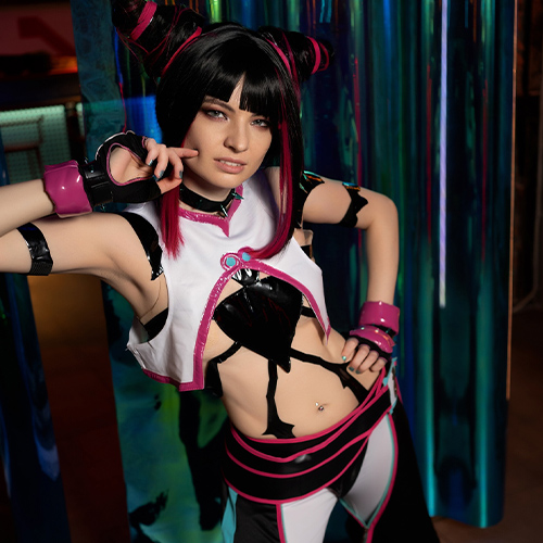 Juri Han strikes a confident pose, her expression embodying the fierce and mischievous personality of the character. The outfit, detailed with black, pink, and white accents, highlights Juri's rebellious and edgy style. The reflective, colorful background adds a dynamic, high-energy vibe to the scene, enhancing the overall intensity of the character's presence