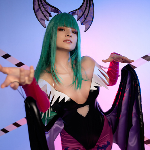 Morrigan Aensland stands confidently, her iconic bat wings extended, framing her alluring stance. Her emerald green hair and vibrant costume come alive against the soft, colorful lighting, while the caution tape adds a playful contrast to her mischievous gaze. This portrayal captures Morrigan's captivating blend of elegance and danger, staying true to her character from Darkstalkers.