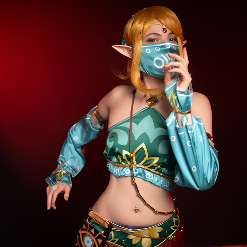 Captivating Link cosplay from The Legend of Zelda: Breath of the Wild, featuring the iconic Gerudo disguise with intricate patterns and vibrant colors. A perfect look for fans seeking Gerudo Link cosplay inspiration or unique Zelda cosplay ideas.