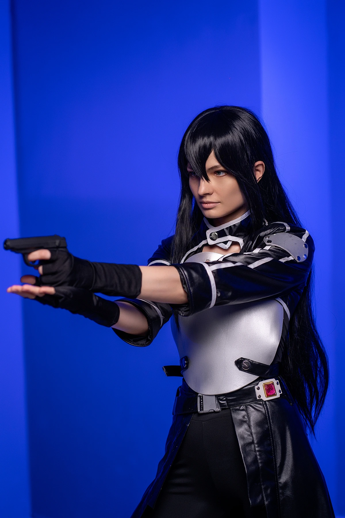 Kirito GGO cosplay aiming pistol extended arms combat stance