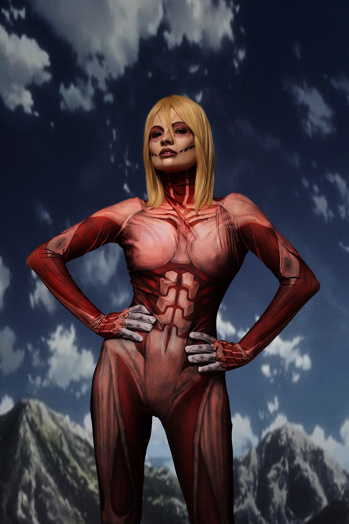 Female Titan cosplay full body power stance, Annie Leonhart AOT cosplay, anatomical muscle bodysuit, outdoor mountain backdrop