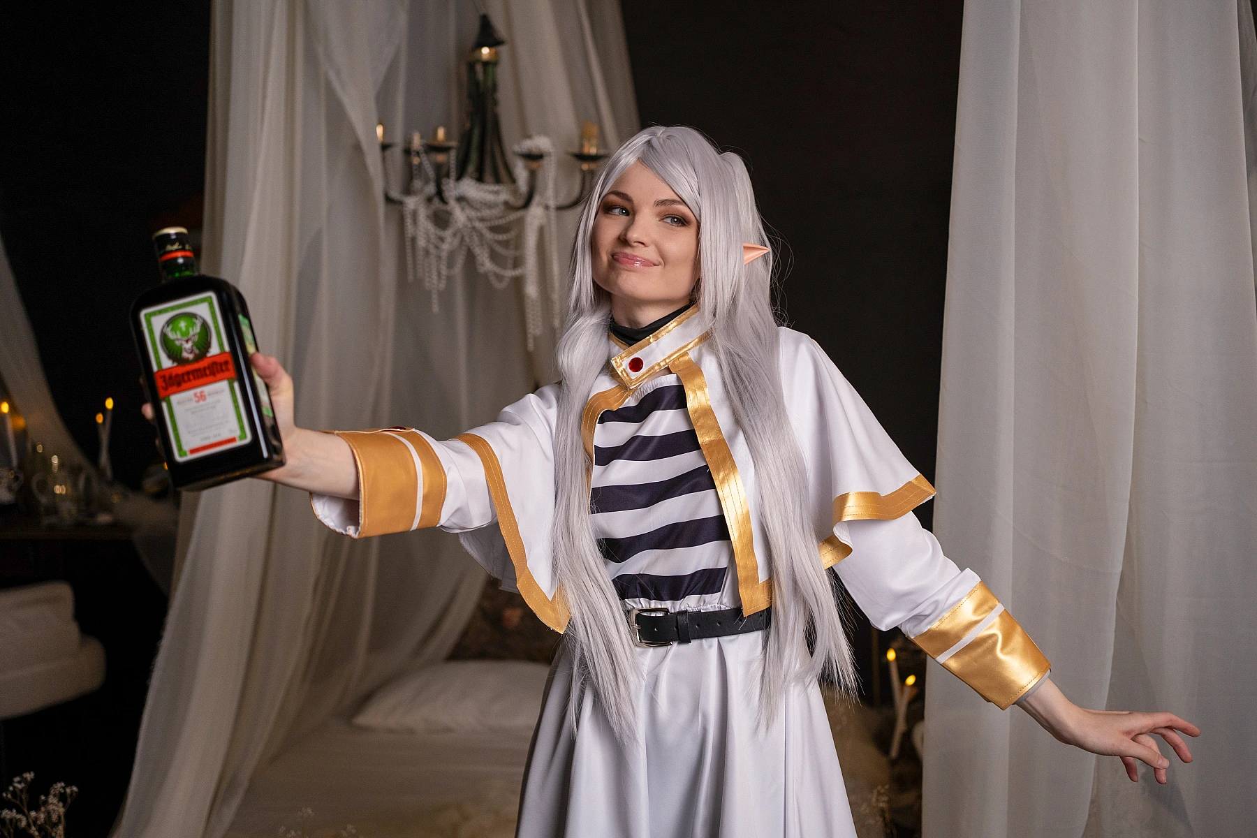 Frieren meme cosplay - funny elf mage holding Jagermeister bottle from Sousou no Frieren