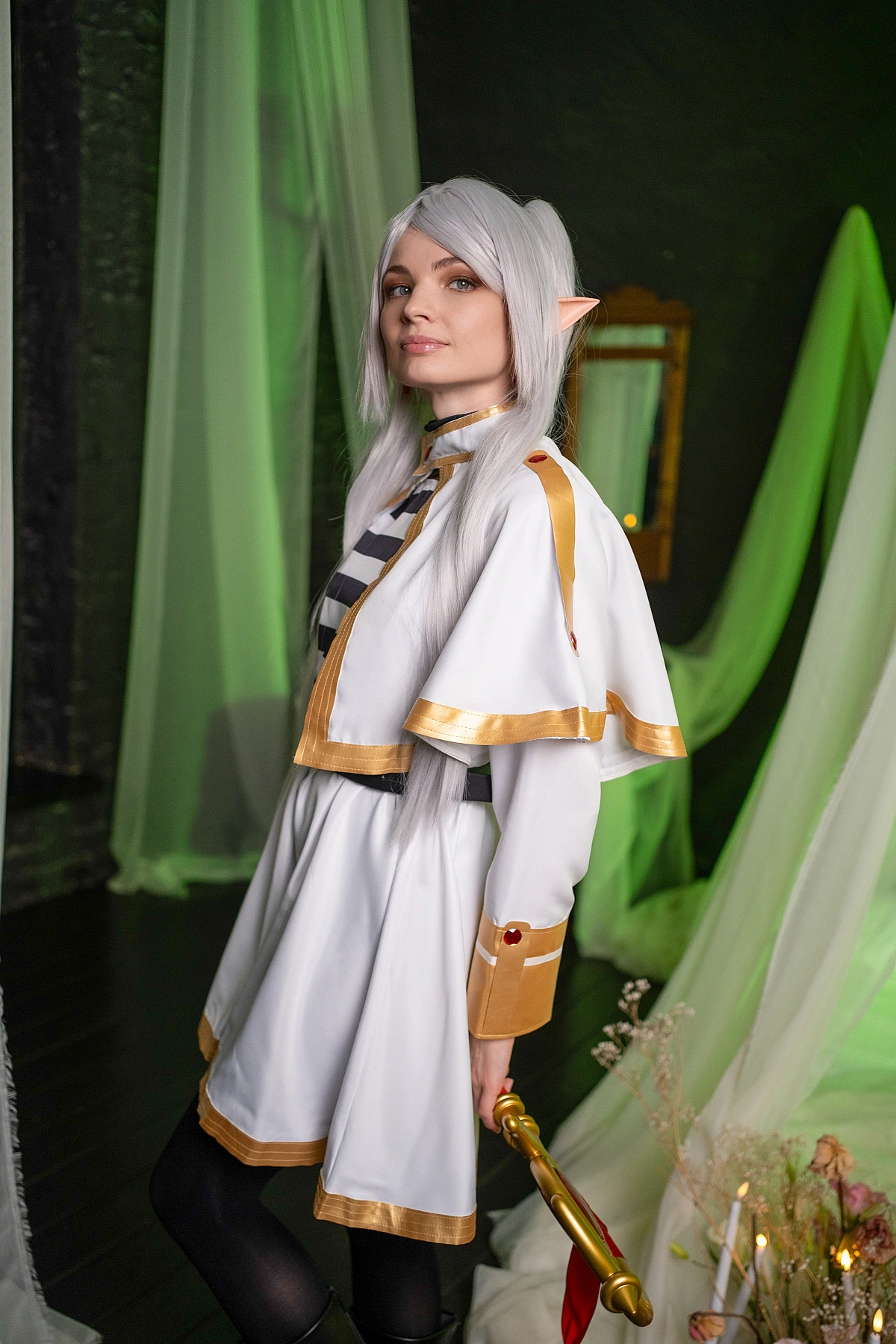 Frieren cosplay portrait - silver haired elf mage from Sousou no Frieren anime in white gold costume