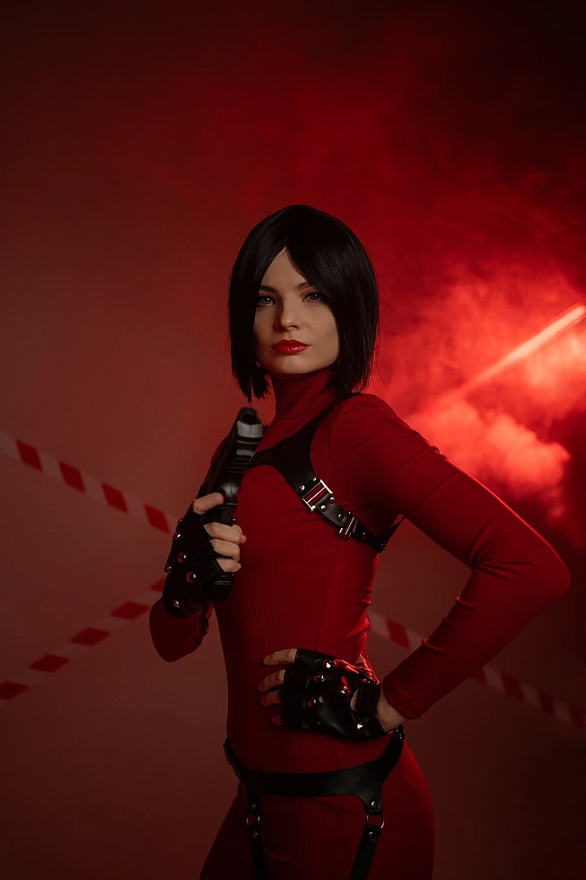 Ada Wong cosplay weapon close red outfit harness red smoke backlight steady gaze high contrast