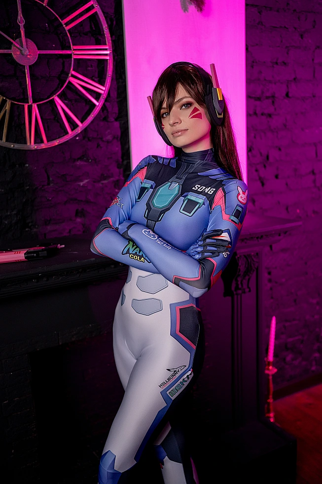 D.Va cosplay confident standing pose, arms crossed, magenta backlight halo, Overwatch bodysuit panel contrast, cyberpunk gaming cosplay