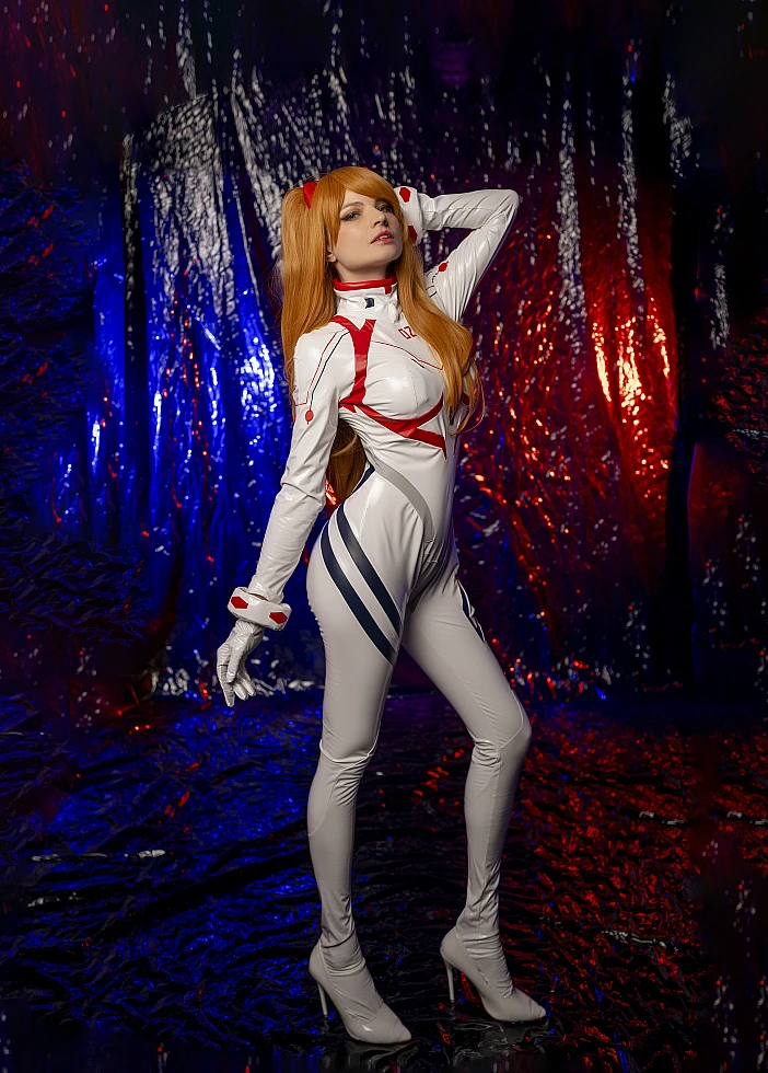 Asuka Langley Cosplay — White Rebuild Plugsuit Over-Shoulder Pose, Red Blue Studio Lighting