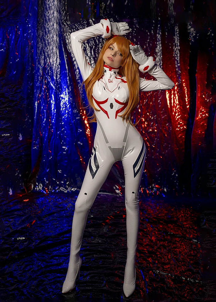 Asuka Langley Cosplay — White Rebuild Plugsuit Arms Raised Frontal Pose, Red Blue Bi-Color Studio Lighting