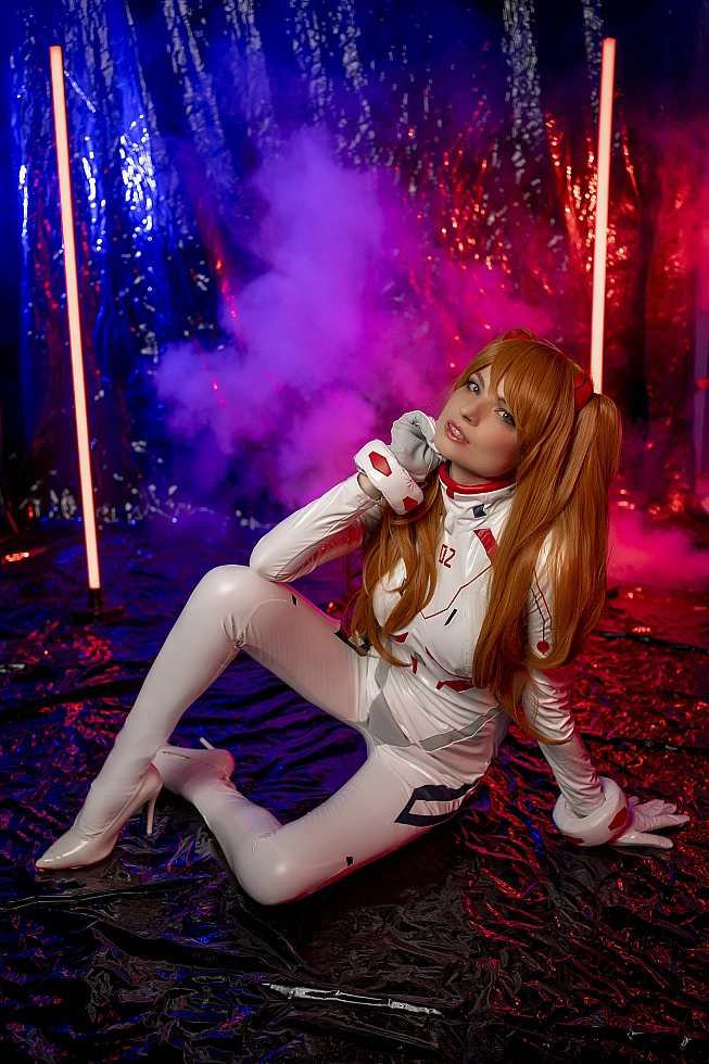 Asuka Langley Cosplay — White Rebuild Plugsuit Seated Floor Pose, Finger to Chin, Dreamy Upward Gaze, Purple Neon Smoke Studio