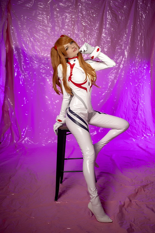 Asuka Langley Cosplay — White Rebuild Plugsuit Three-Quarter Profile, Leaning on Black Bar Stool with Foot on Rung, Over-Shoulder Gaze, Flat Purple Studio Backdrop